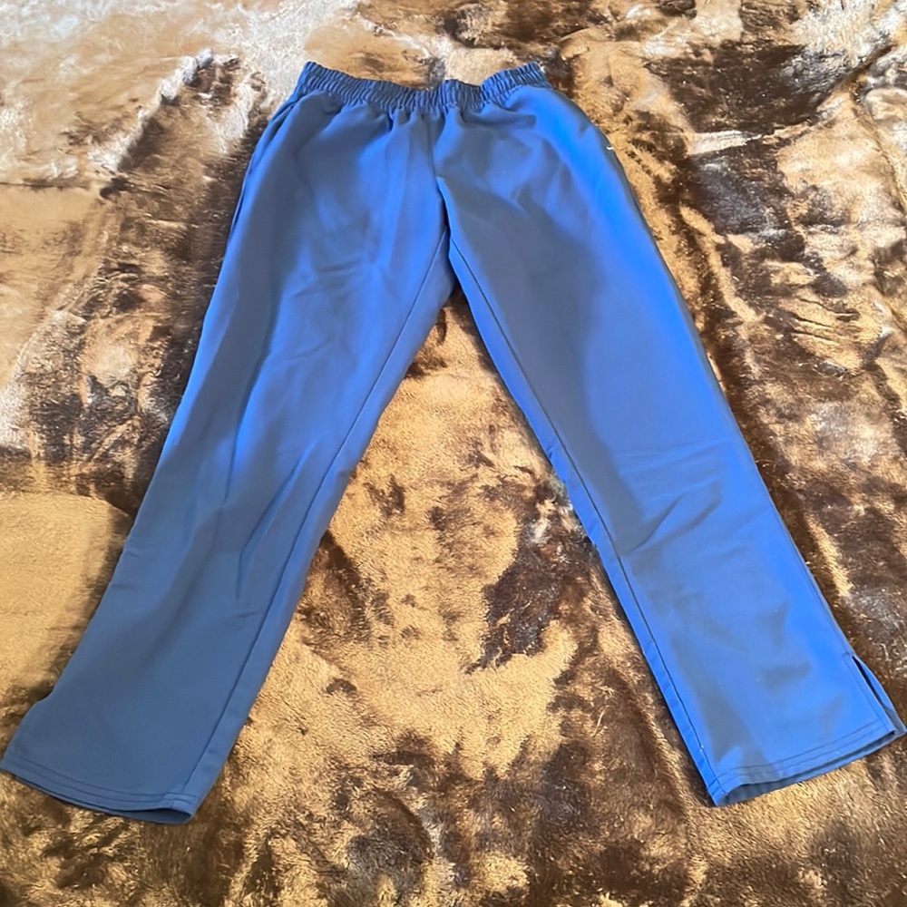 Blue Jaanuu scrub pants. Size XS. Good condition.